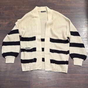 Charlotte Russe Urban Heritage black and tan cardigan NWOT
Size small